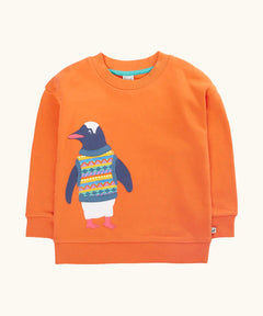 Frugi organic cotton superb sweatshirt salamander orange with penguin applique. The penguin is wearing a fairisle style tank top. 