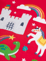 Close up of the appliques on the Frugi red organic cotton adventure magic applique long sleeve top. 