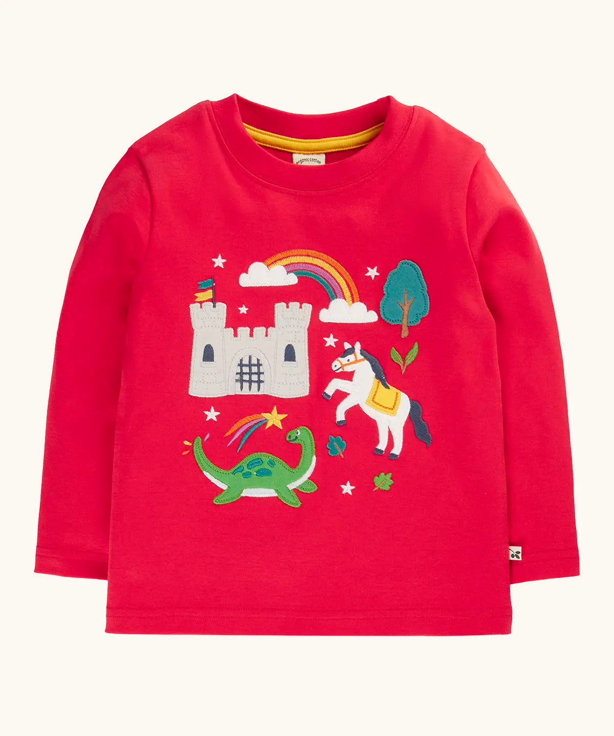 Frugi red organic cotton adventure magic applique top. Long sleeved top with castle, rainbow, tree horse and nessie appliques on the front. 