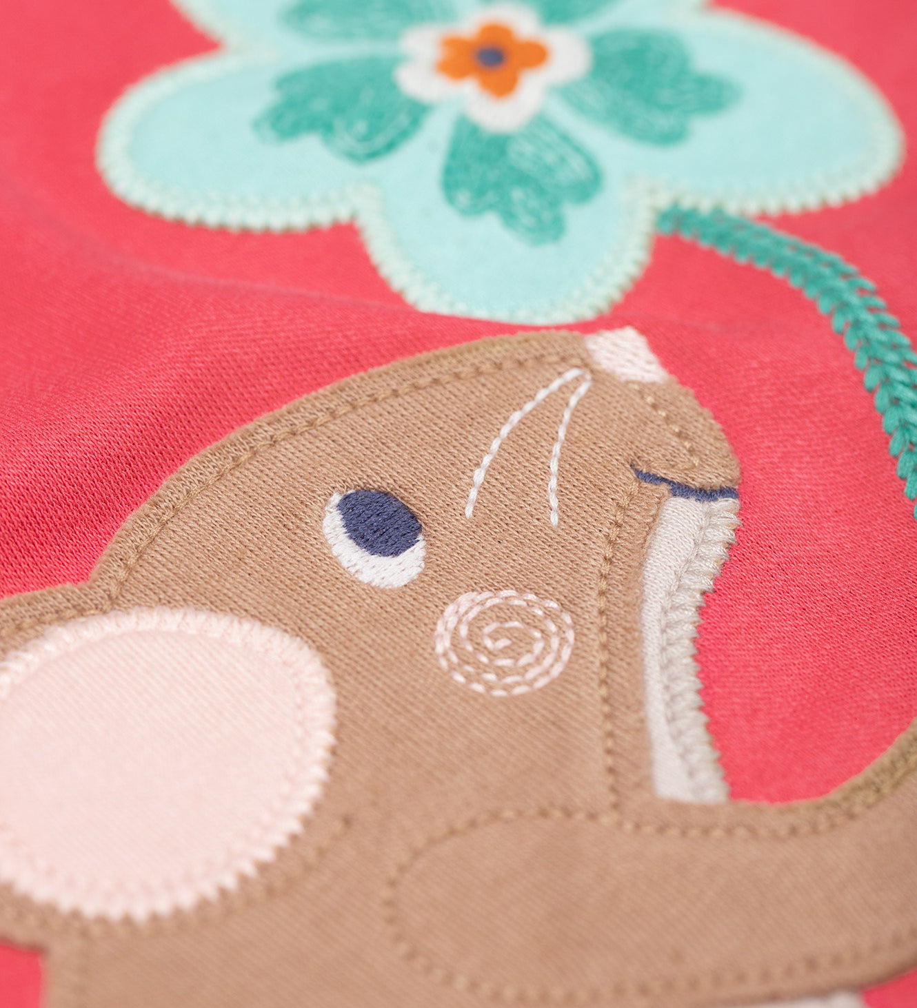 A close up of the mouse on the front of the Frugi rose pink Organic Cotton Adventure mouse Applique long sleeved children's Top. This top is a part of a wide range of organic cotton clothing for children available here at Babipur. 