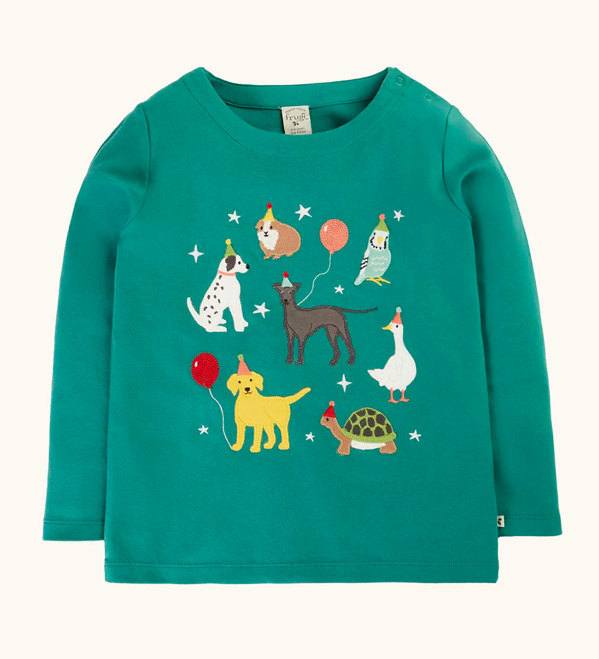 Frugi organic cotton anna pet Paw-Ty appliqué long sleeve children's top. Green top with applique dogs, guinea pig, budgie, goose and tortoise wearing party hats and balloons and star sparkle details. 