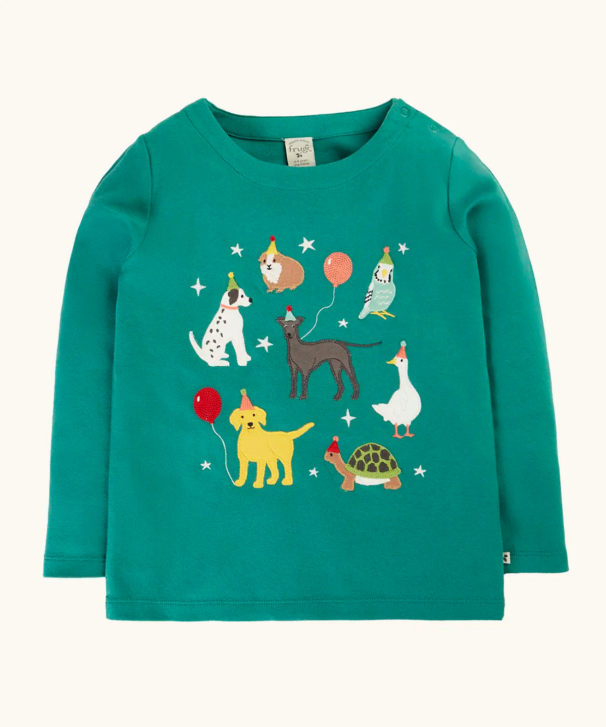 Frugi organic cotton anna pet Paw-Ty appliqué long sleeve children's top. Green top with applique dogs, guinea pig, budgie, goose and tortoise wearing party hats and balloons and star sparkle details. 