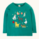 Frugi organic cotton anna pet Paw-Ty appliqué long sleeve children's top. Green top with applique dogs, guinea pig, budgie, goose and tortoise wearing party hats and balloons and star sparkle details. 