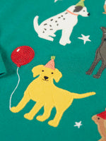 Close up of the yellow labrador applique with embrodered party hatand  balloon detail on the Frugi organic cotton anna pet Paw-Ty long sleeve children's top. 