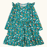 Frugi organic cotton annika skater dress with winter drives print. All over print featuring houses, campers, snow topped mountains, snowman and trees in a festive scene. 