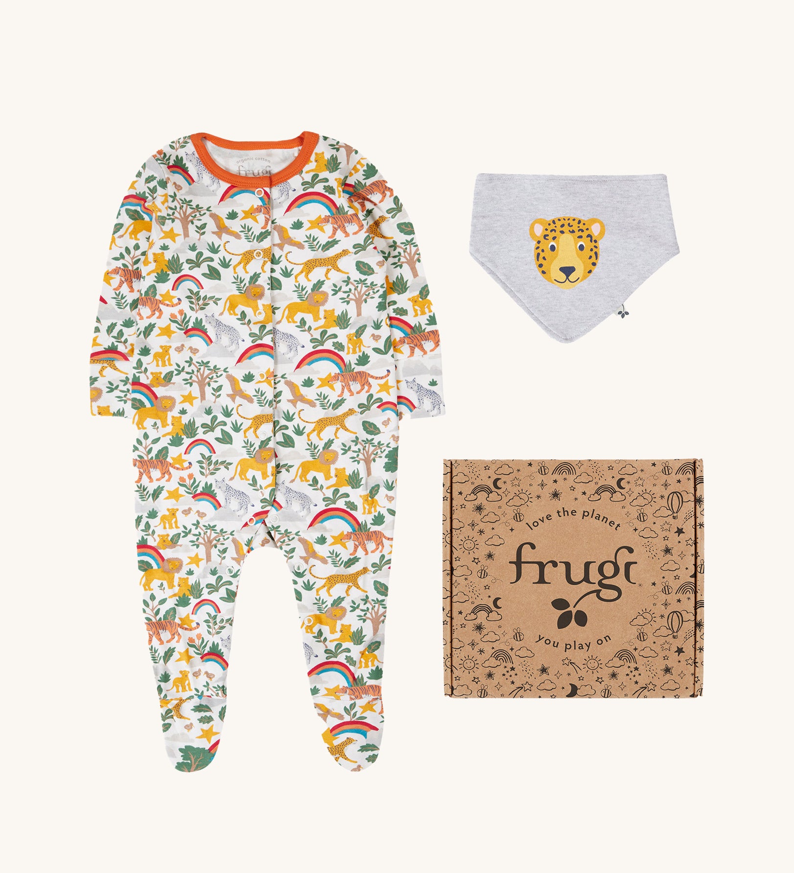 Frugi Into The Wild Organic Cotton Babygrow Gift Set. The set comes with a white babygrow covered with the into the wild all over print and a grey bandana style bib with an applique of a cheetahs face on it.
This gift set is a part of a wide range of organic cotton clothing for children available here at Babipur. 