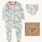 Frugi Unicorn Forest Organic Cotton Babygrow Gift Set. This baby grow set  comes with a white babygrow decorated with an all over unicorn forest themed print and comes with a matching bandanna style bib. 
This baby gift set is a part of a wide range of organic cotton clothing for children available here at Babipur. 
