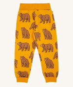 Frugi kids beary wild parsnip joggers available at Babipur. A GOTS organic cotton jogger in dark yellow with sketched style prints of a brown bear 