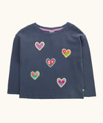 Frugi bethany organic cotton long sleeved child's navy top with heart applies with floral embroidery details.