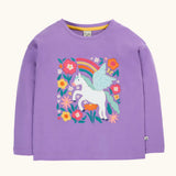 Frugi organic cotton bethany long sleeved periwinkle purple top with a pegasus applique with a rainbow and flowers. 