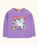 Frugi organic cotton bethany long sleeved periwinkle purple top with a pegasus applique with a rainbow and flowers. 