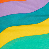 Close up of the rainbow ric rac tripes on the Frugi organic cotton bryher long sleeve top.