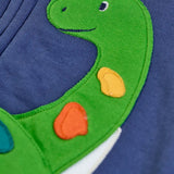 Close up of the green loch ness monster applique on the front of the Frugi organic cotton carbis navy kids hoodie.