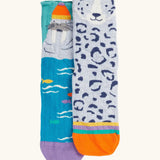 Frugi organic cotton character socks 2 pack. One blue pair with a walrus wearing a bobble hat, one pair with a grey leopard.