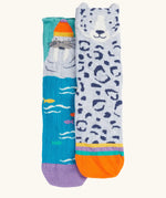 Frugi organic cotton character socks 2 pack. One blue pair with a walrus wearing a bobble hat, one pair with a grey leopard.