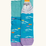 The walrus pair from the Frugi organic cotton character socks 2 pack. Blue socks with fish and a walrus wearing a bobble hat.