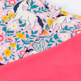 Close up of the popper closure on the back of the top from the Frugi organic cotton Charlotte outfit.