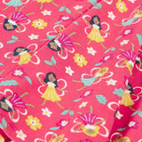 Close up of the Frugi GOTS organic cotton sofia skater dress in fairy flutter. Pink background with colourful fairy print featuring flowers and leaves.