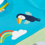  elephant and toucan character applique on the front