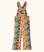 Frugi organic cotton ethel flared dungarees with rectangle flower stamps design. Multicoloured design with a variety of different flowers. 