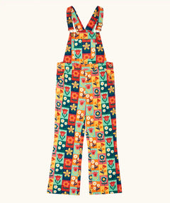 Frugi organic cotton ethel flared dungarees with rectangle flower stamps design. Multicoloured design with a variety of different flowers. 