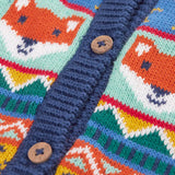 Close up of the wooden buttons on the Frugi fox fair isle organic cotton wenn knitted waistcoat. Multi-coloured fair isle knit with navy edges.