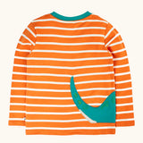 Back of the Frugi organic cotton felix long sleeve orange breton stripe top with teal nessie wrap around applique.