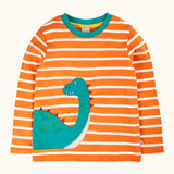 Frugi organic cotton felix long sleeve orange breton stripe top with teal nessie wrap around applique.