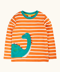 Frugi organic cotton felix long sleeve orange breton stripe top with teal nessie wrap around applique.
