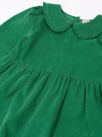 Close up of the frilled peter pan style collar on the Frugi organic cotton peony holly green corduroy dress.