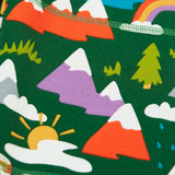 Close up of the colourful mountains featured on the Frugi organic cotton green malpas joggers with rescue trails print. 