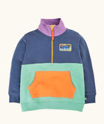 Frugi organic cotton half zip sweatshirt hotchpotch wildlife. Colourblock top with light blue bottom half, navy op and arms, purple collar and orange kangaroo pocket. Rectangle shaped wildlife badge on the chest.