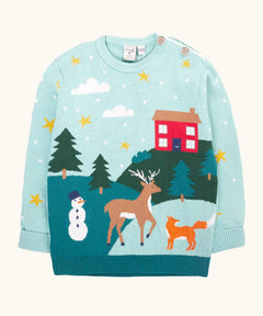 Frugi organic cotton elwood knitted jumper with a Winter tales design. Light blue long sleeved jumper with a landscape design on the front featuring a red house, snowman, reindeer, fox, trees and snow and stars.