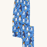 Frugi organic cotton kids libby leggings with a penguin waddle print on a blue background.