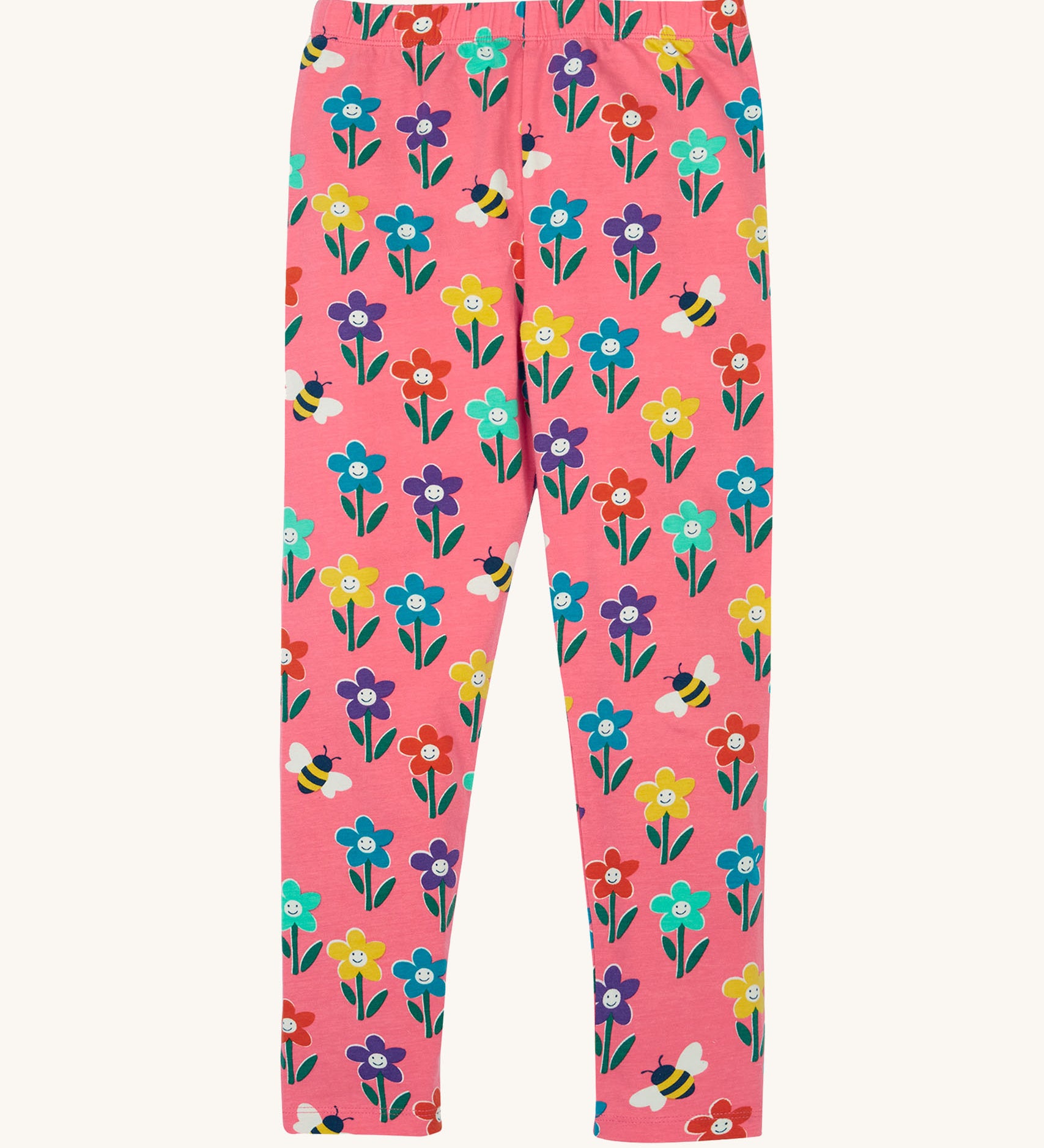 Frugi organic cotton kids Libby leggings with a fun flowers print on a pink background.
