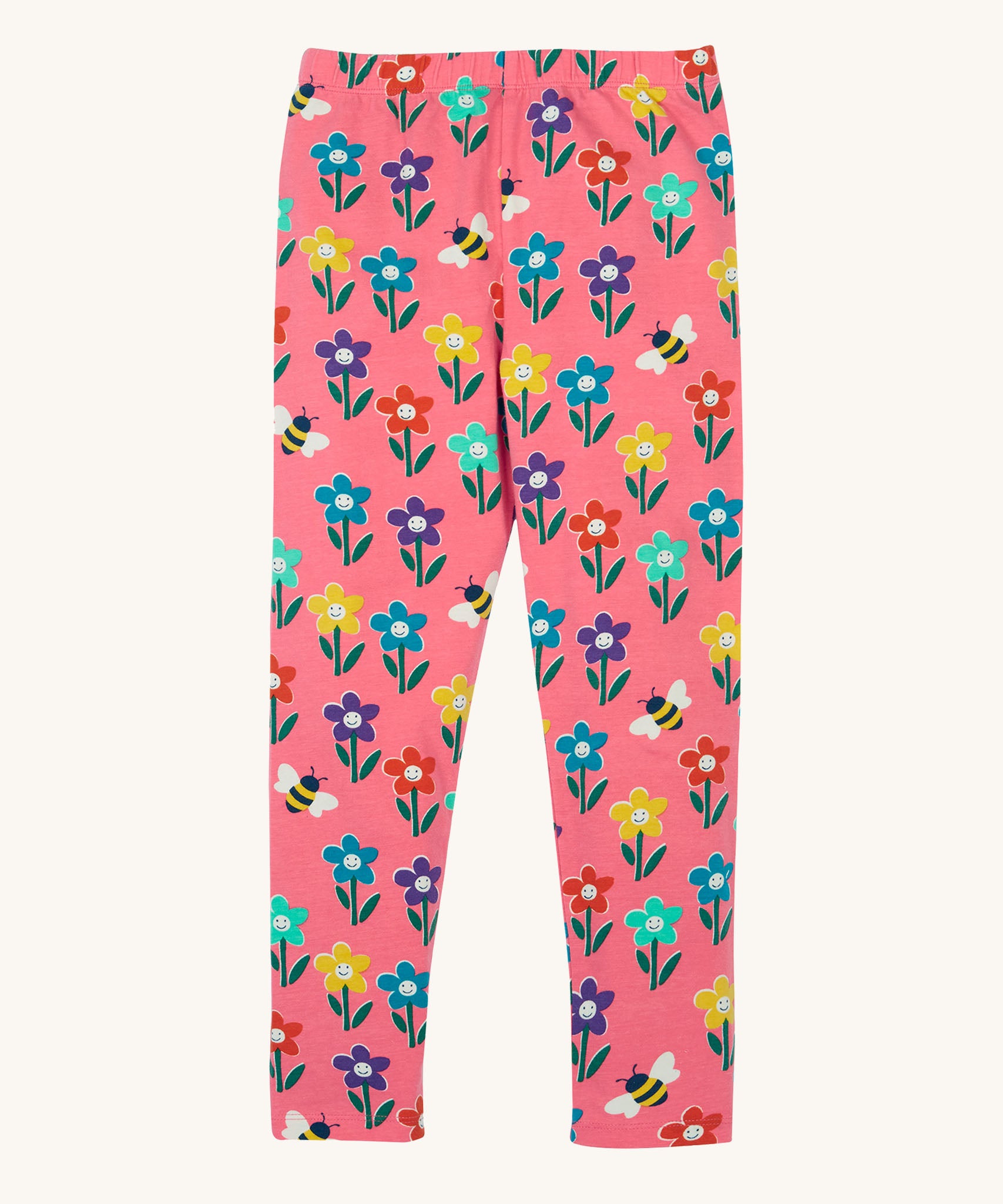 Frugi organic cotton kids Libby leggings with a fun flowers print on a pink background.