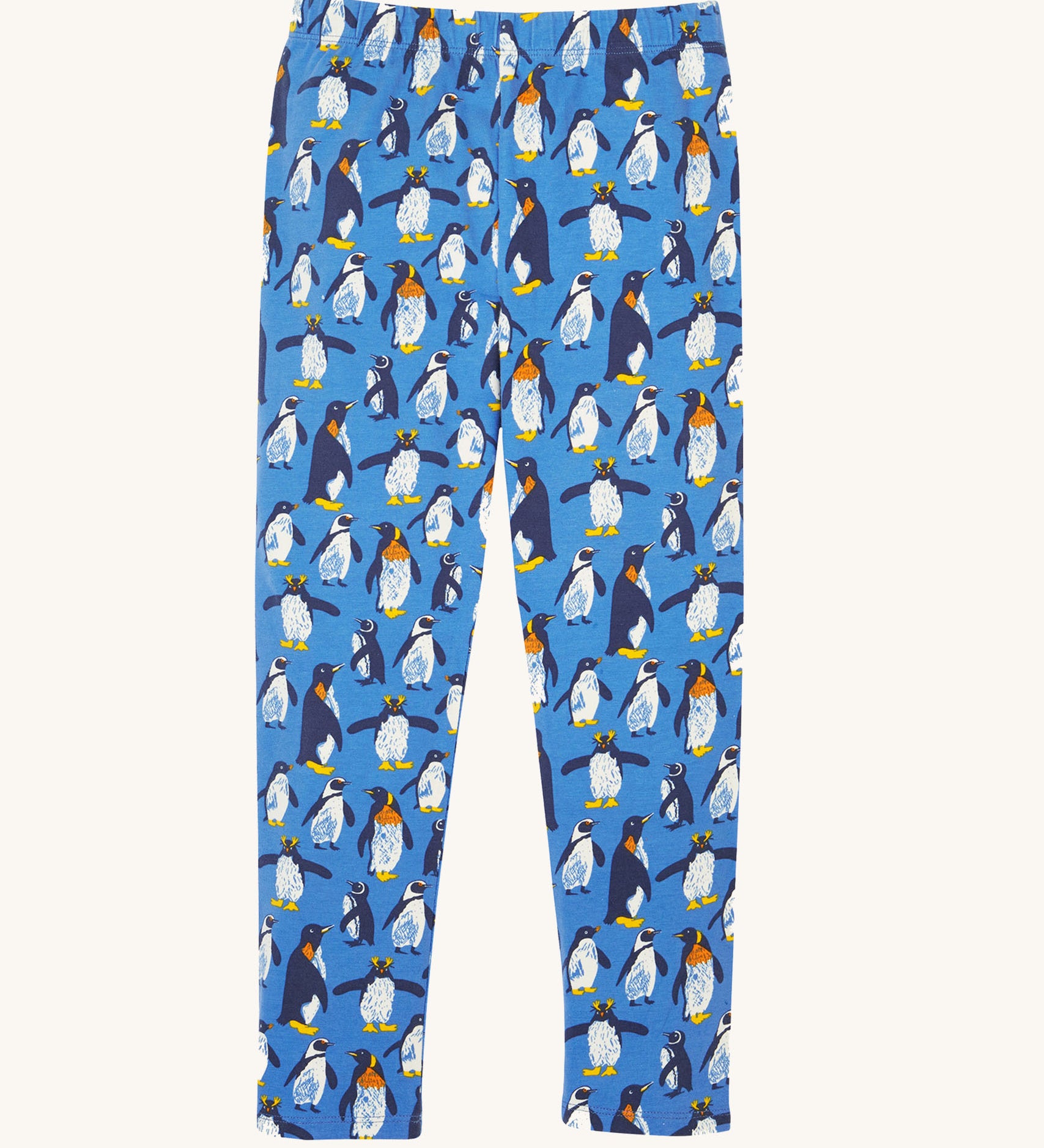 Frugi organic cotton kids libby leggings with a penguin waddle print on a blue background.