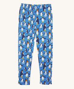 Frugi organic cotton kids libby leggings with a penguin waddle print on a blue background.