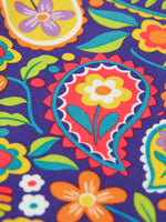 Close up of the print on the Frugi organic cotton libby leggings with a pretty paisley print. 