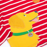 A close up of the yellow dog applique on the front of the Frugi Discovery Organic Cotton Circular Kids' Top with a red and white Breton Stripe.