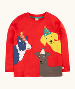 Frugi organic cotton adventure circular long sleeve top scarlet red with three dogs wearing party hats appliques on the front. 