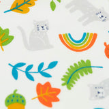 Close up of the wild cats print on the Frugi white organic cotton lovely babygrow .