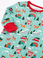 Close up of the fold over cuffs on the Frugi organic cotton lovely babygrow with a winter drives print.