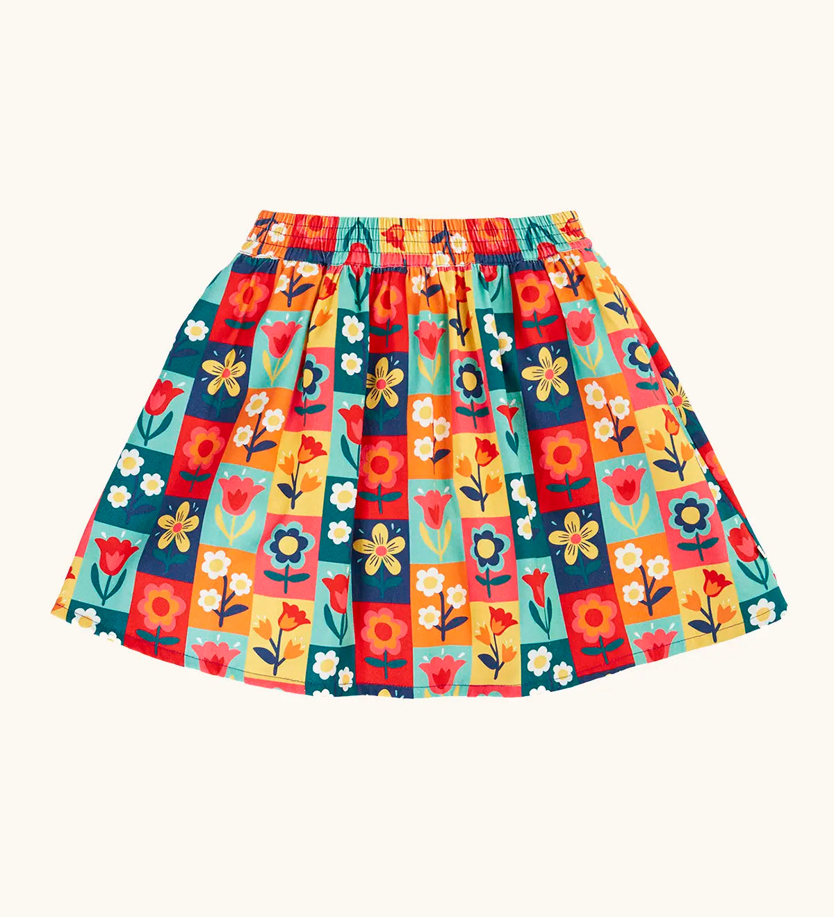 Frugi organic cotton marta twill flower stamps skirt. Multi coloured rectangles with flowers. 