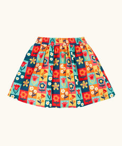 Frugi organic cotton marta twill flower stamps skirt. Multi coloured rectangles with flowers. 