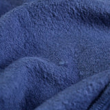 Close of the fluffy lining inside the Frugi organic cotton carbis navy nessie kids hoodie.