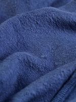 Close of the fluffy lining inside the Frugi organic cotton carbis navy nessie kids hoodie.
