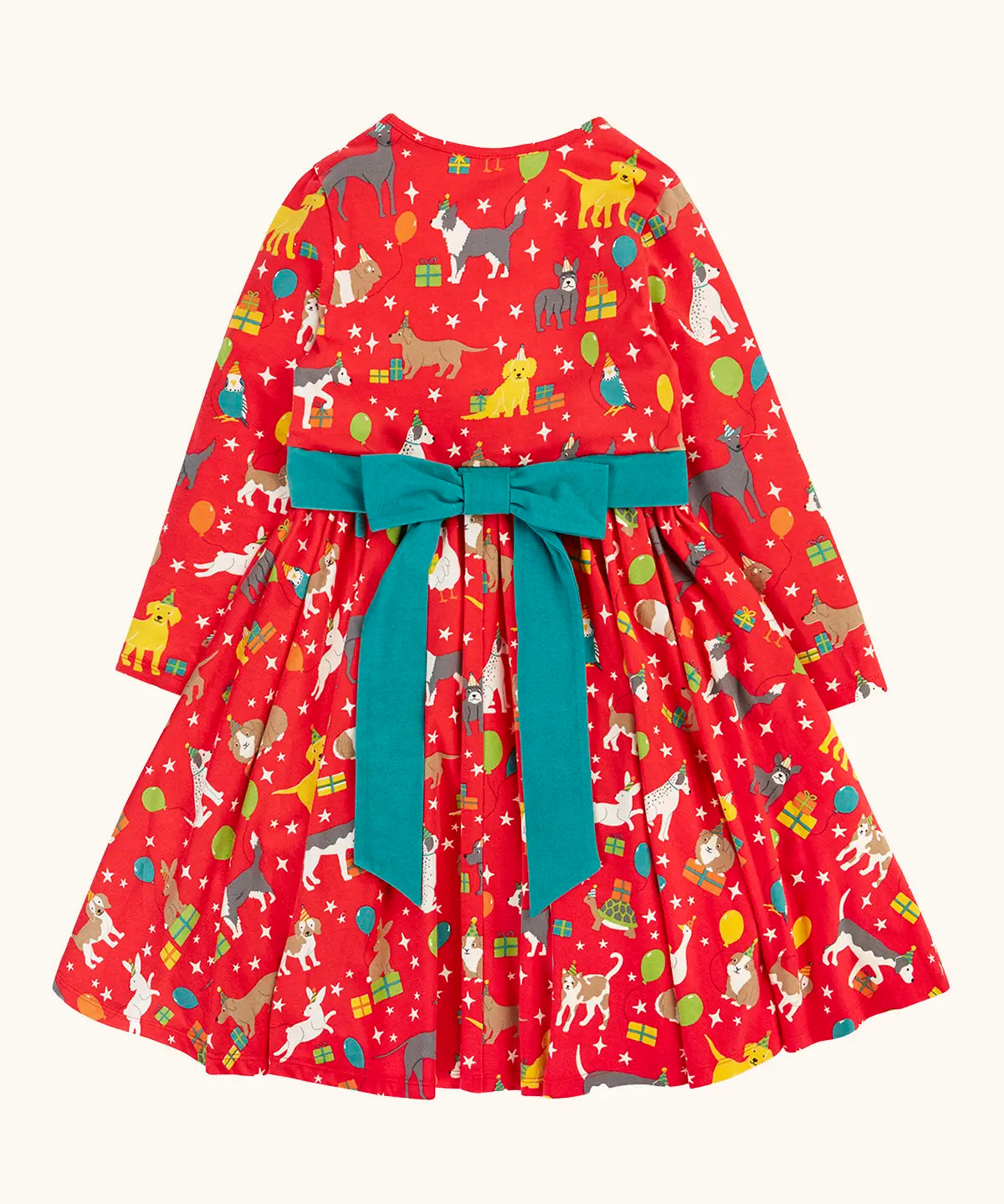 Back of the Frugi organic cotton pink party skater dress in a pet paw-ty print with a detachable teal bow. 