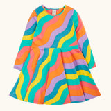 Frugi GOTS organic cotton long sleeved sofia skater dress with a rainbow ric rac pattern.