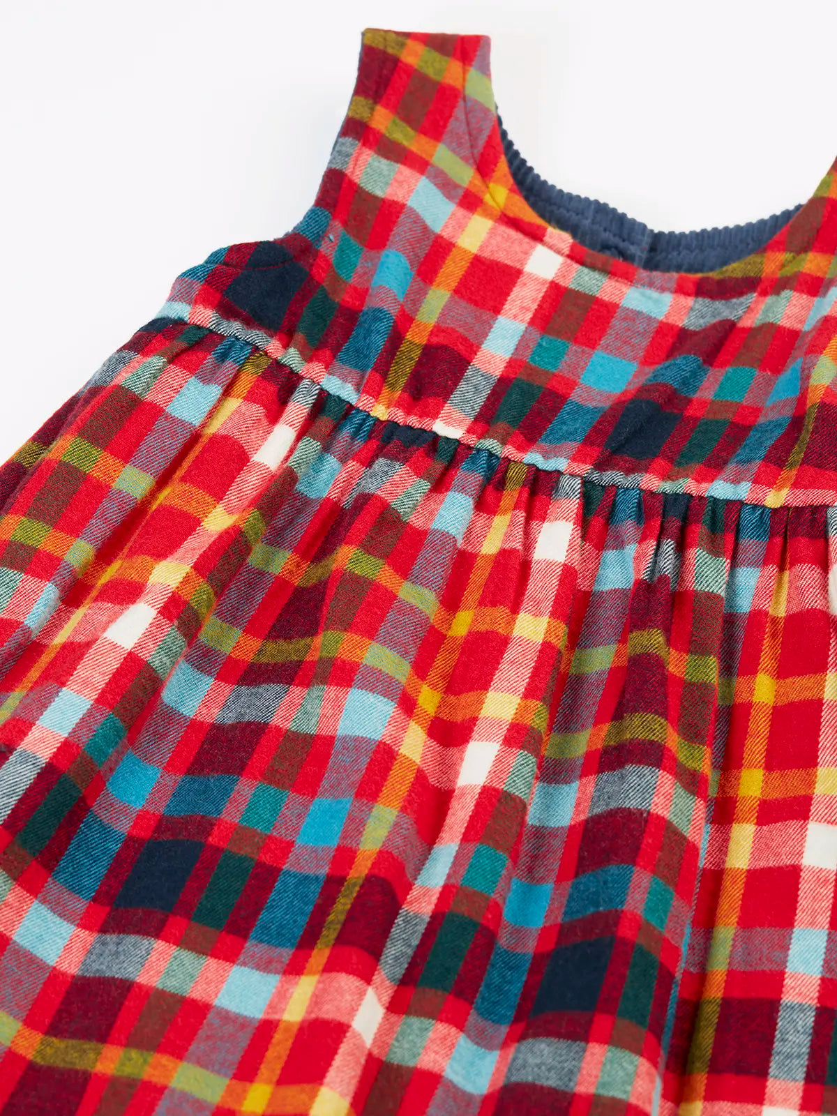 Frugi organic cotton rosalie reversible dress, on the festive multicoloured check side.